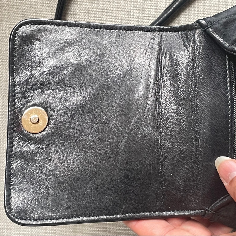 CHANEL Black Quilted Crossbody Bag with Pearl Flower Medallion - Picture 11 of 13